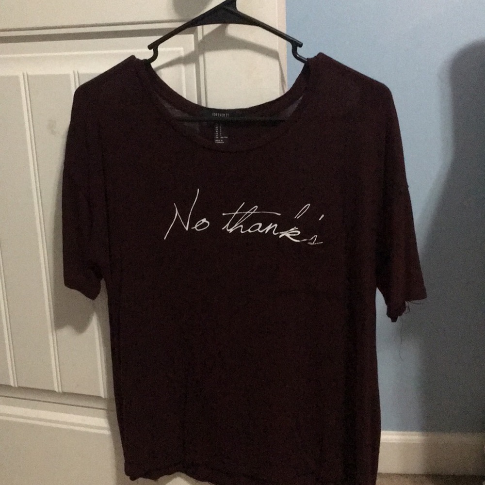 A flowy maroon shirt. That says "No thanks"